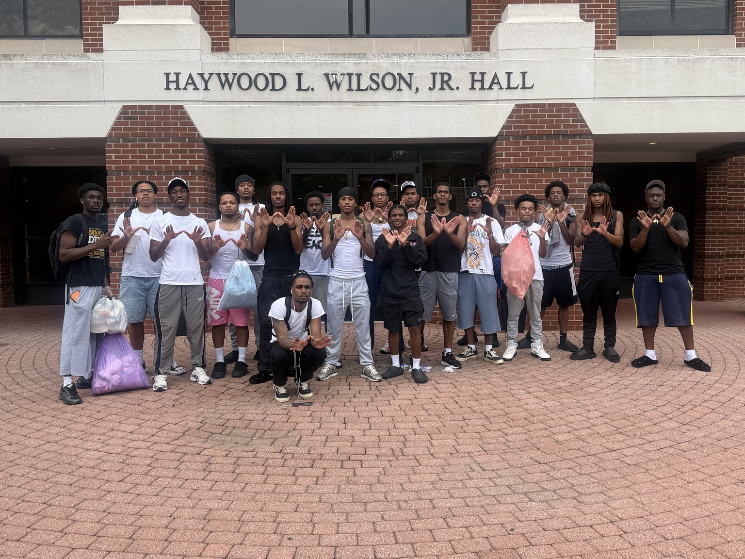 Campus group gathered outside Haywood L. Wilson Jr. Hall