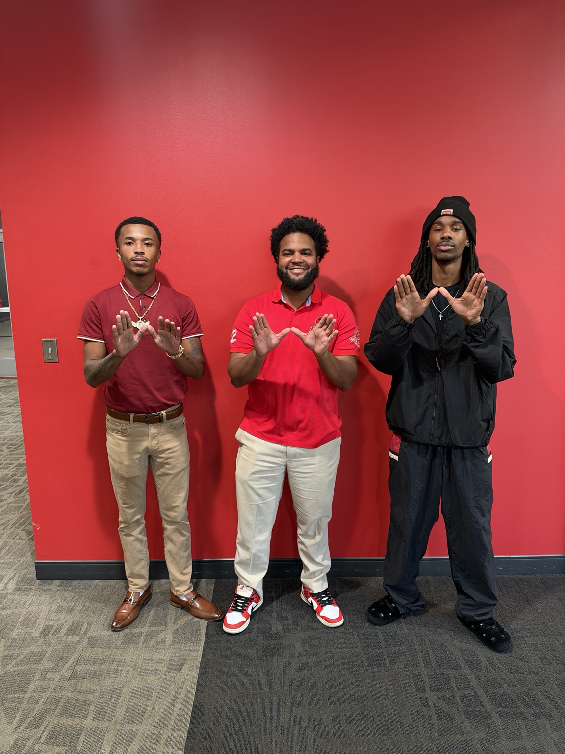 Three student leaders posing together