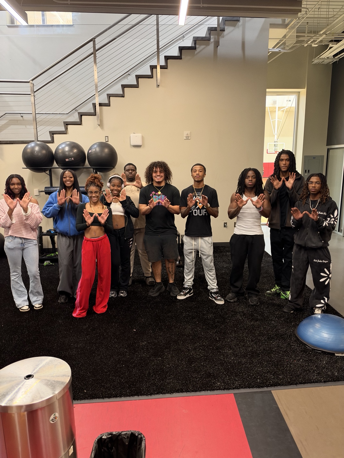 Young people gathered for an indoor community event