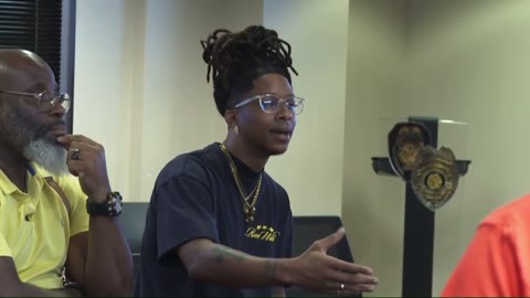 A moment from the community news video